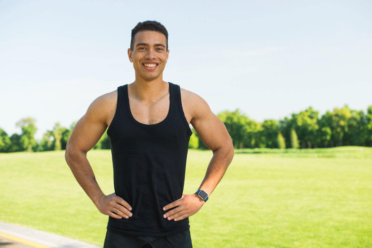 Athletic man practising outdoors